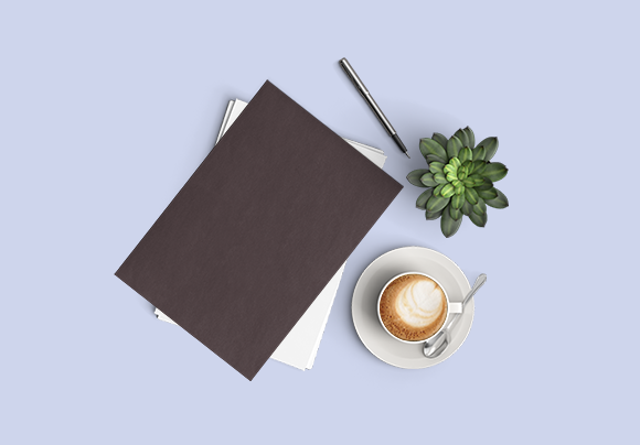 Un café, une plante et des documents - Entreprises